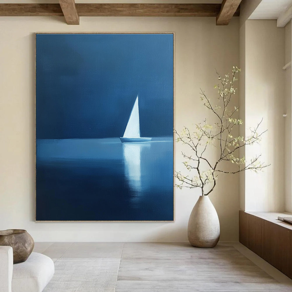 Abstract painting featuring a minimalist silhouette of a sailboat on calm water with elegant blue and white hues, creating a serene atmosphere.STSC1087