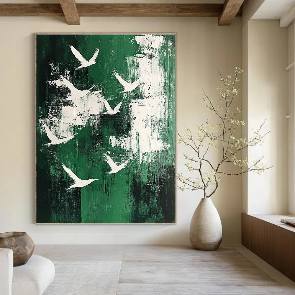 Large abstract painting featuring white birds soaring above an emerald green landscape in a minimalistic style.STSC363