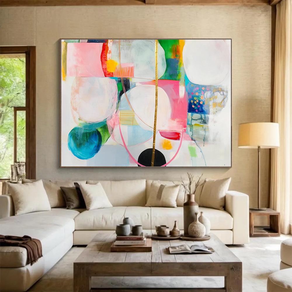 Large abstract painting with colorful shapes, gold lines, and a hanging golden string, featuring a black circle on a white background.SC375