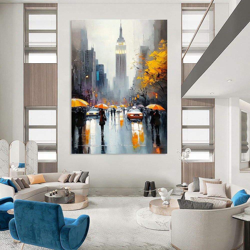 A large abstract painting capturing the Empire State Building with vibrant crowds on a rainy day featuring reflections and warm accents.STSC1137