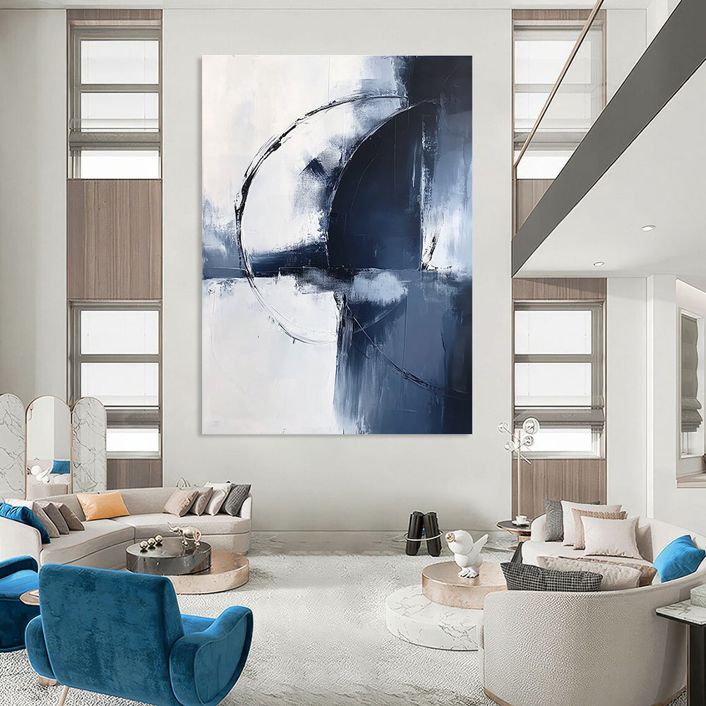 Large abstract painting in light navy and white tones featuring bold brushstrokes and an elegant minimalist style for sophisticated decor.STSC1355