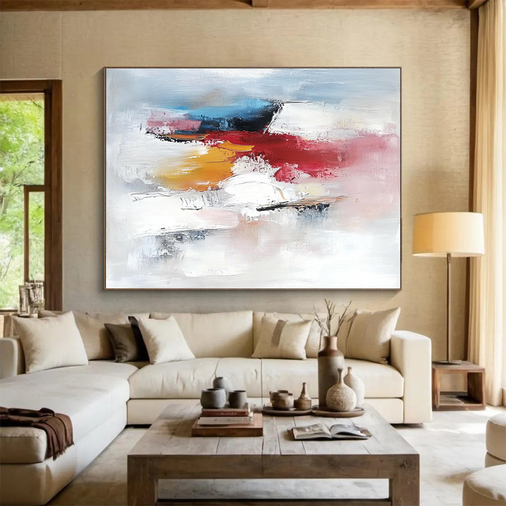 Large abstract painting featuring a serene ice landscape with white light blue hints of red and pink soft brush strokes and textured details.SC157