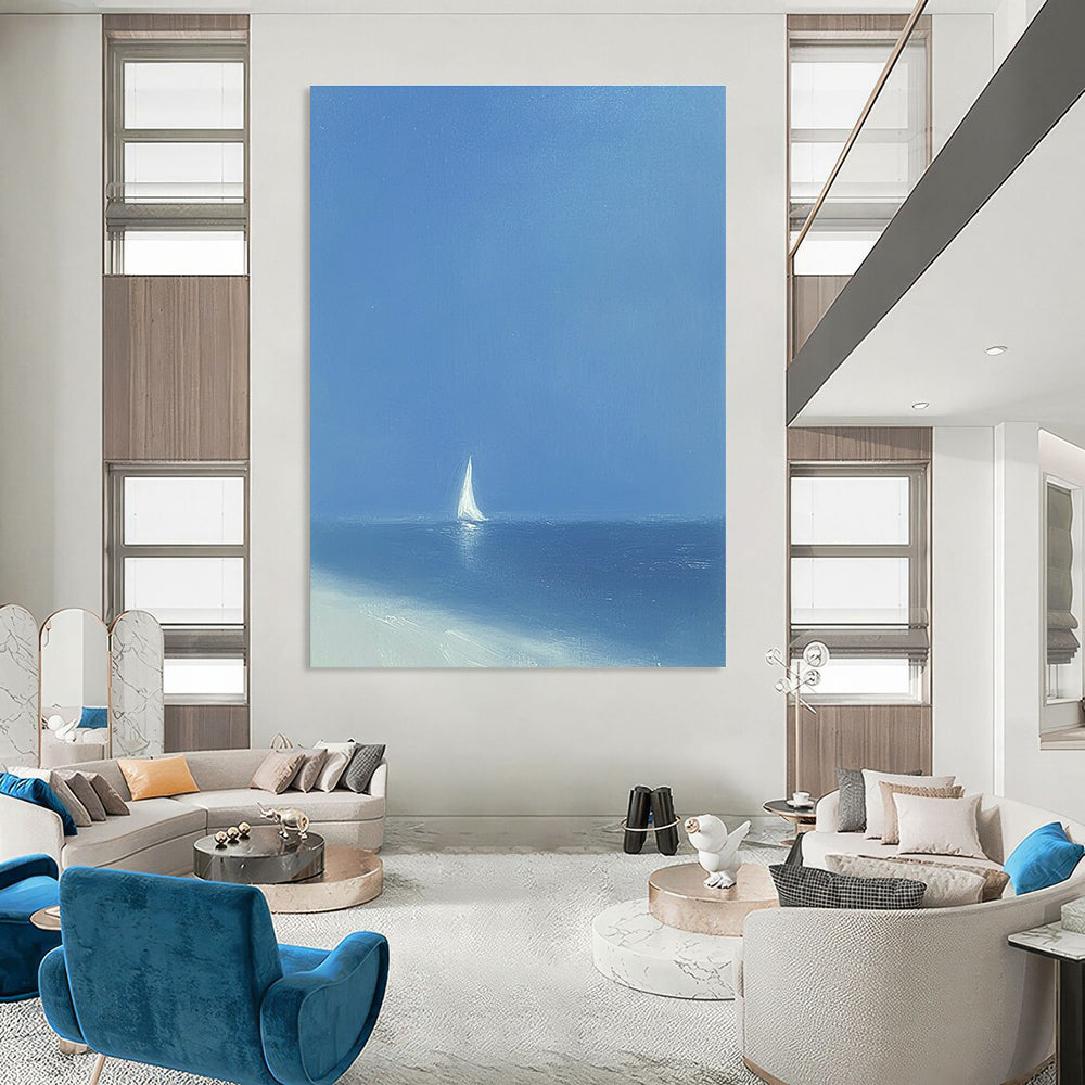 A large abstract painting featuring a minimalist white sailboat on the ocean under a blue sky with soft tones and wide brush strokes.STSC1062