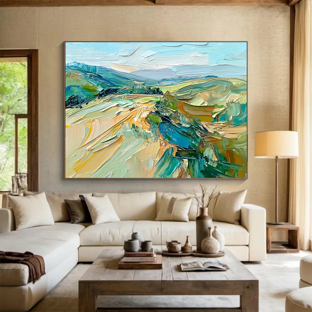Large abstract oil painting of the French countryside featuring impasto strokes in green, blue, beige, and brown for a natural earthy feel.SC127