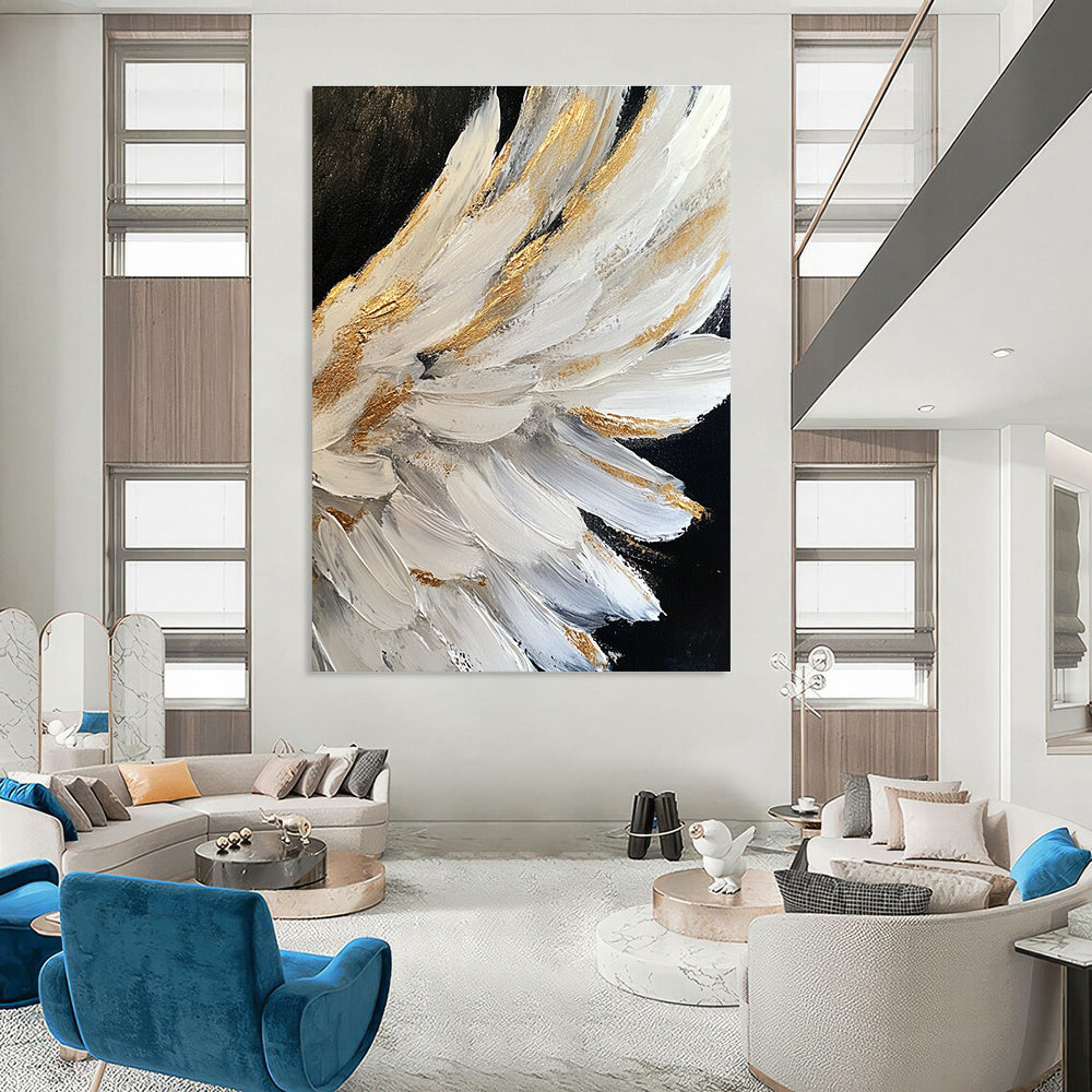 Large abstract painting of white angel wings with gold accents on a black background featuring heavy brush strokes and palette knife work.STSC006
