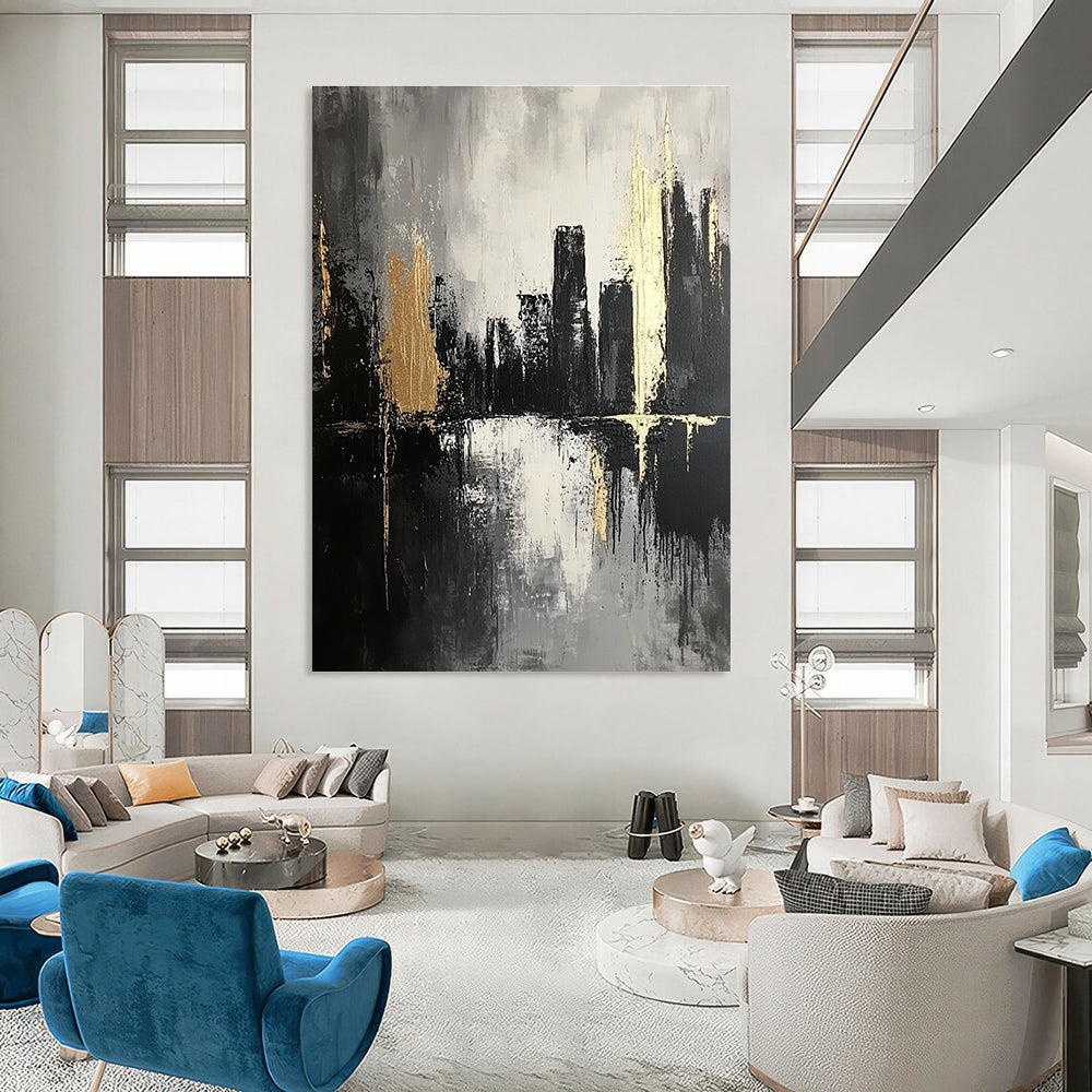 Large abstract painting featuring thick brush strokes in dark grays and subtle gold highlights creating an atmospheric monochromatic cityscape on canvas.STSC020