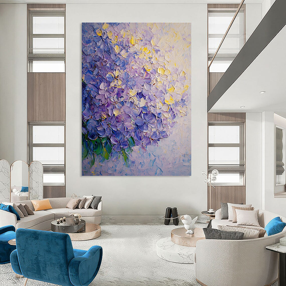 A large abstract oil painting of lilac flowers featuring soft shadows and smooth textures in light yellow and purple tones.STSC1027