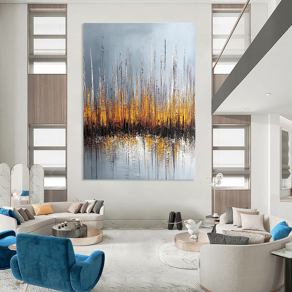 Large abstract painting of silver and gold reeds with reflections on water set against a muted gray background.STSC330