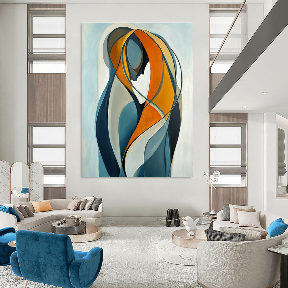 Large abstract painting of two intertwined figures in vibrant orange and yellow against a light blue background emphasizing connection and softness.STSC1143