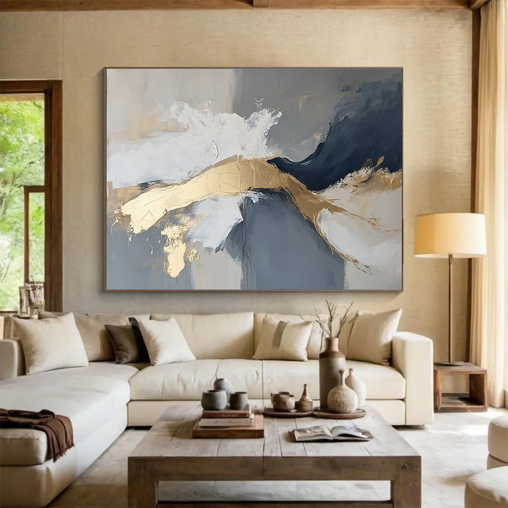 Large abstract painting in gray and white with gold accents, atmospheric and moody, featuring intricate details.SC140