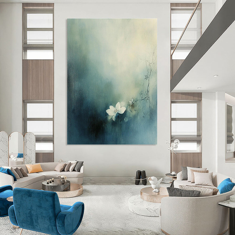 Large abstract painting featuring a small white flower blooming amid muted blue-green tones and hazy fog.STSC631