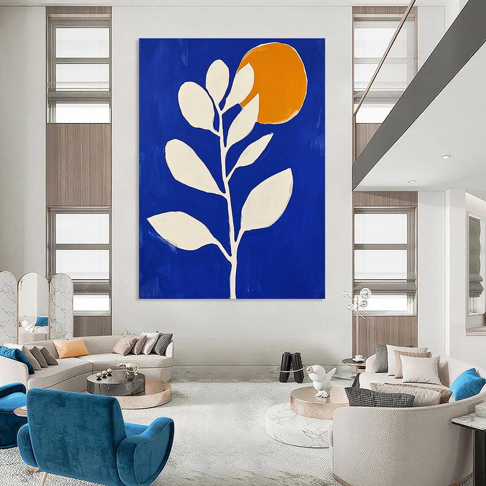 Large abstract painting in blue and white featuring minimalist flower shapes and an orange sun with bold brush strokes.STSC920