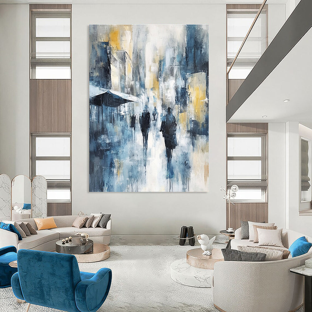 Large abstract painting of an urban cityscape in cool blue tones with hints of yellow and gray showcasing soft brushstrokes and impressionist influence.STSC277