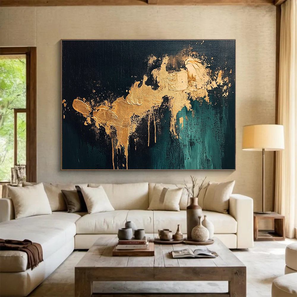 Large abstract painting with gold splashes on dark green background showcasing intricate details and a moody atmospheric feel.SC259