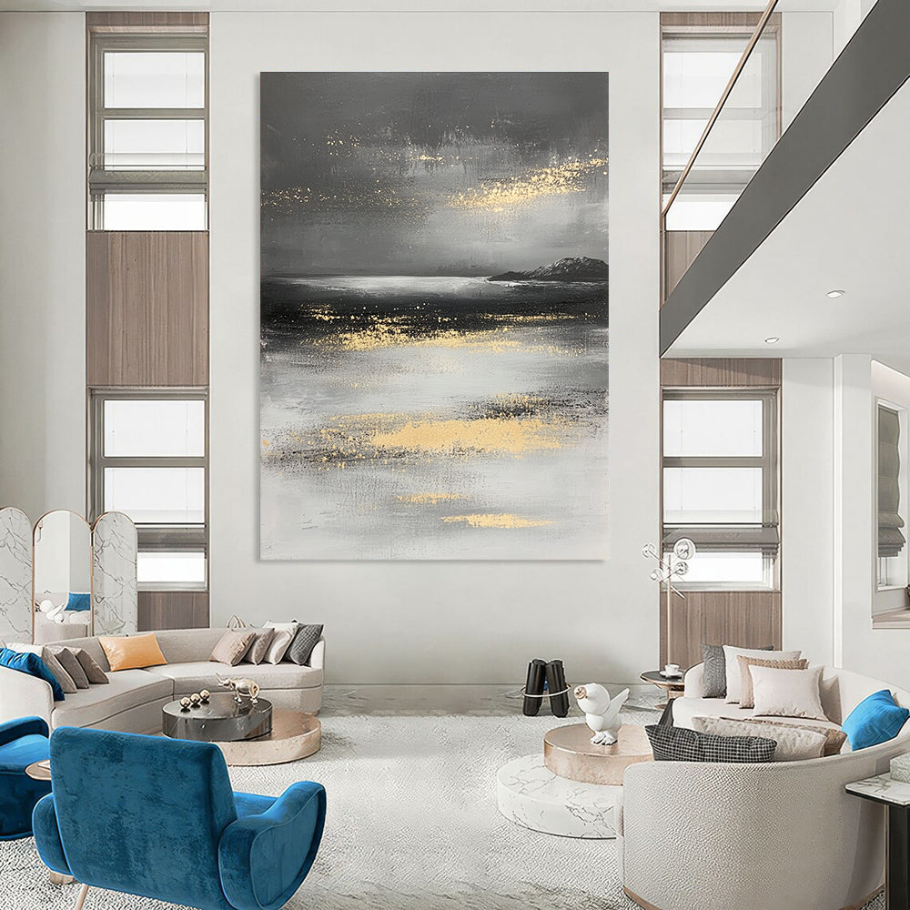 Large abstract painting in gray and white with gold accents depicting a mysterious ocean landscape and misty island.STSC064