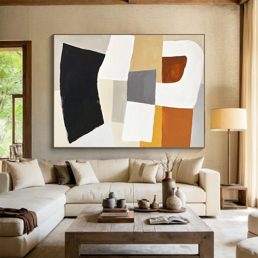 Large abstract painting in white and grey with orange accents featuring soft black shape and beige square in balanced composition.SC513