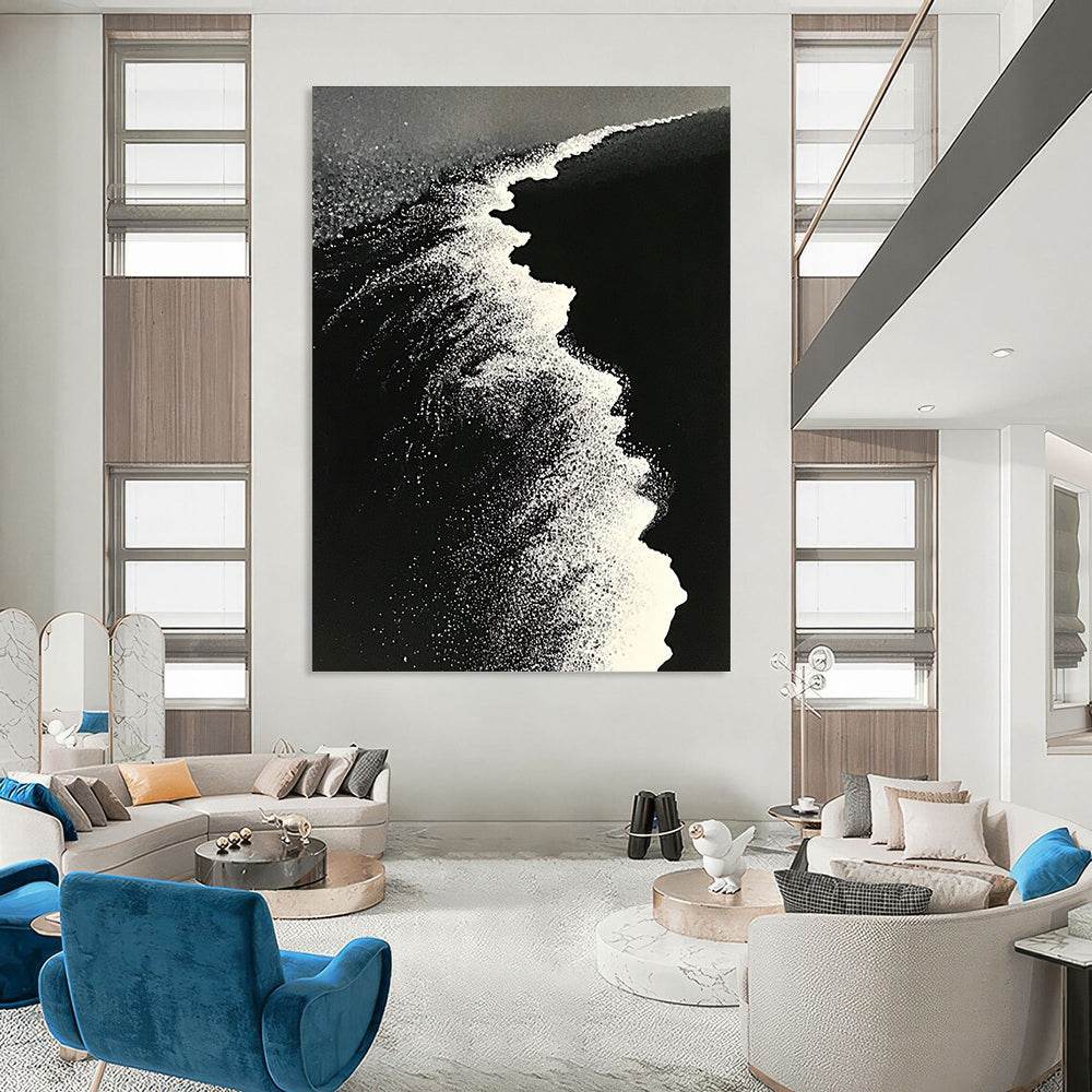 Large abstract painting of ocean waves blending into a white beach with contrasting black sand captured in a dynamic perspective.STSC1430