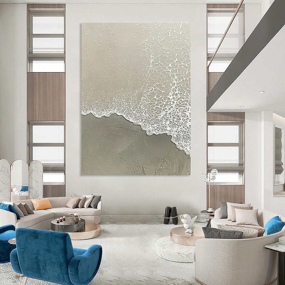 Abstract painting depicting the serene transition of water meeting sand with muted tones of grayish-white and light green.STSC955