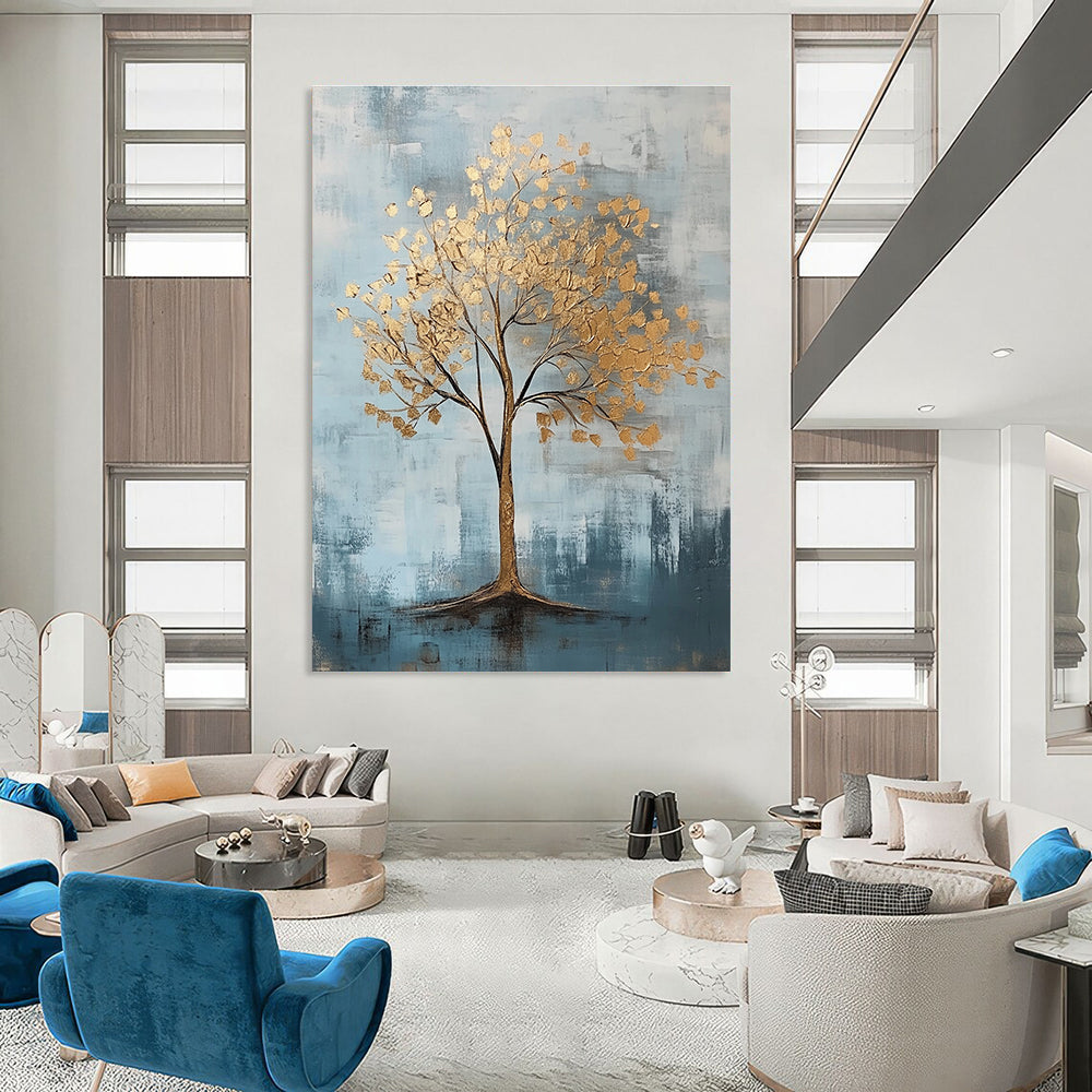 Abstract artwork featuring gold leaf accents against a cool gray and light blue backdrop with textured brush strokes.STSC838