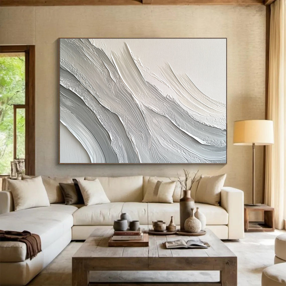 Large abstract painting featuring swirling white and gray patterns that create depth and texture against a plain background.SC451