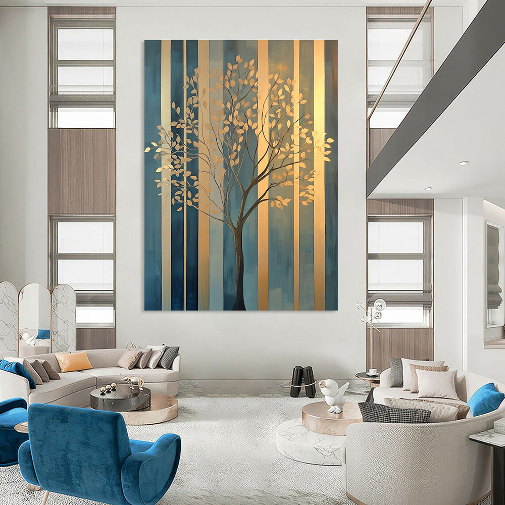 Large abstract painting featuring elegant gold tree branches against geometric blue green patterns with soft edges and a warm glow on canvas.STSC1117
