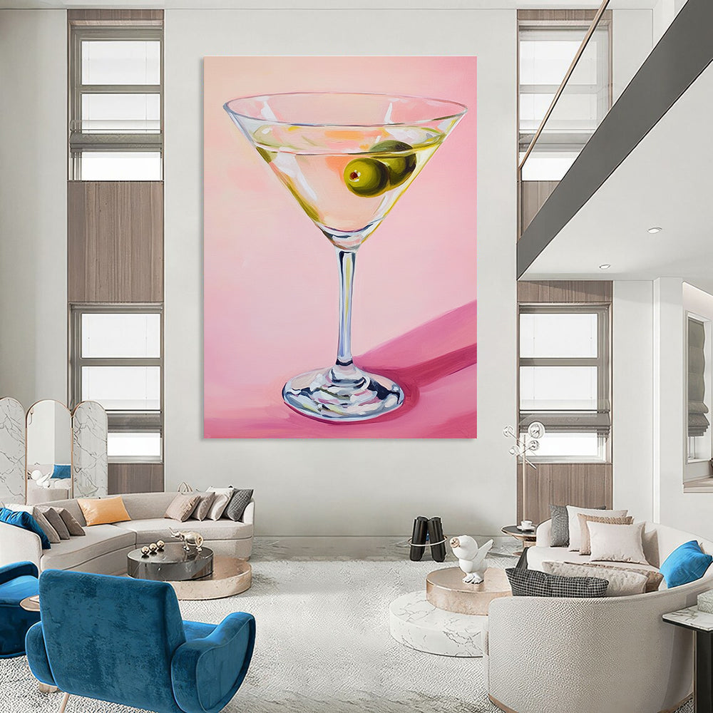 Abstract painting featuring a martini glass with an olive against a soft pink background showcasing gentle lighting and serene elegance.STSC1383