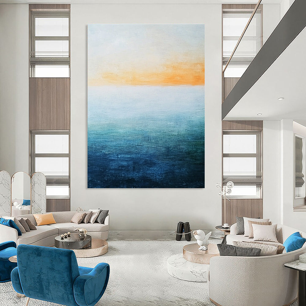 Abstract landscape featuring a vast water expanse in blue and green hues beneath a soft orange sky with a minimalist oil painting style.STSC074