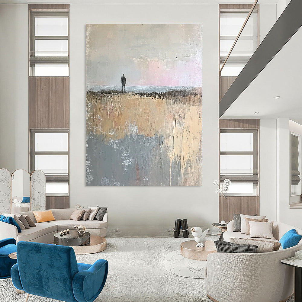 Large abstract painting in muted beige and gray tones showcasing a tranquil open field and distant sea horizon with soft brushstrokes.STSC101