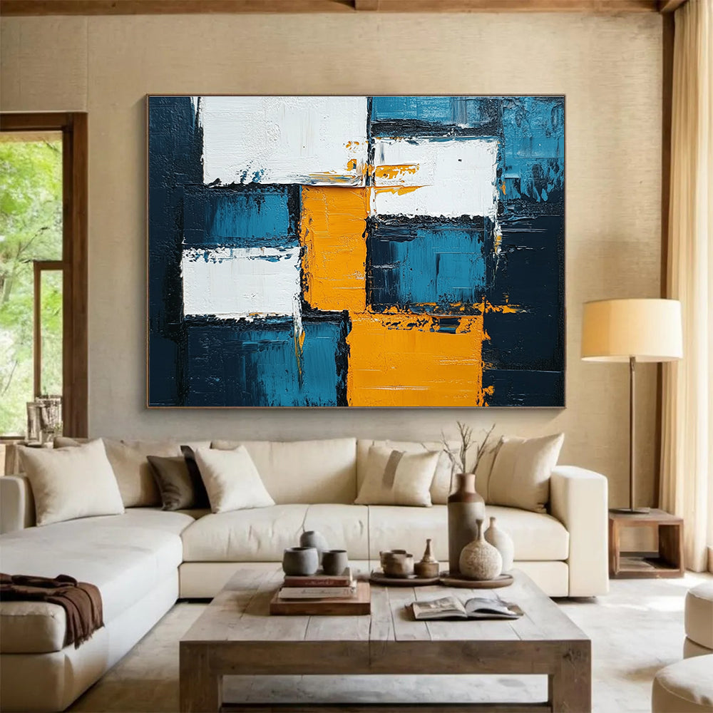 Large abstract painting featuring blue, white, and yellow squares with thick impasto texture, embodying bold expressionism for any modern space.SC122