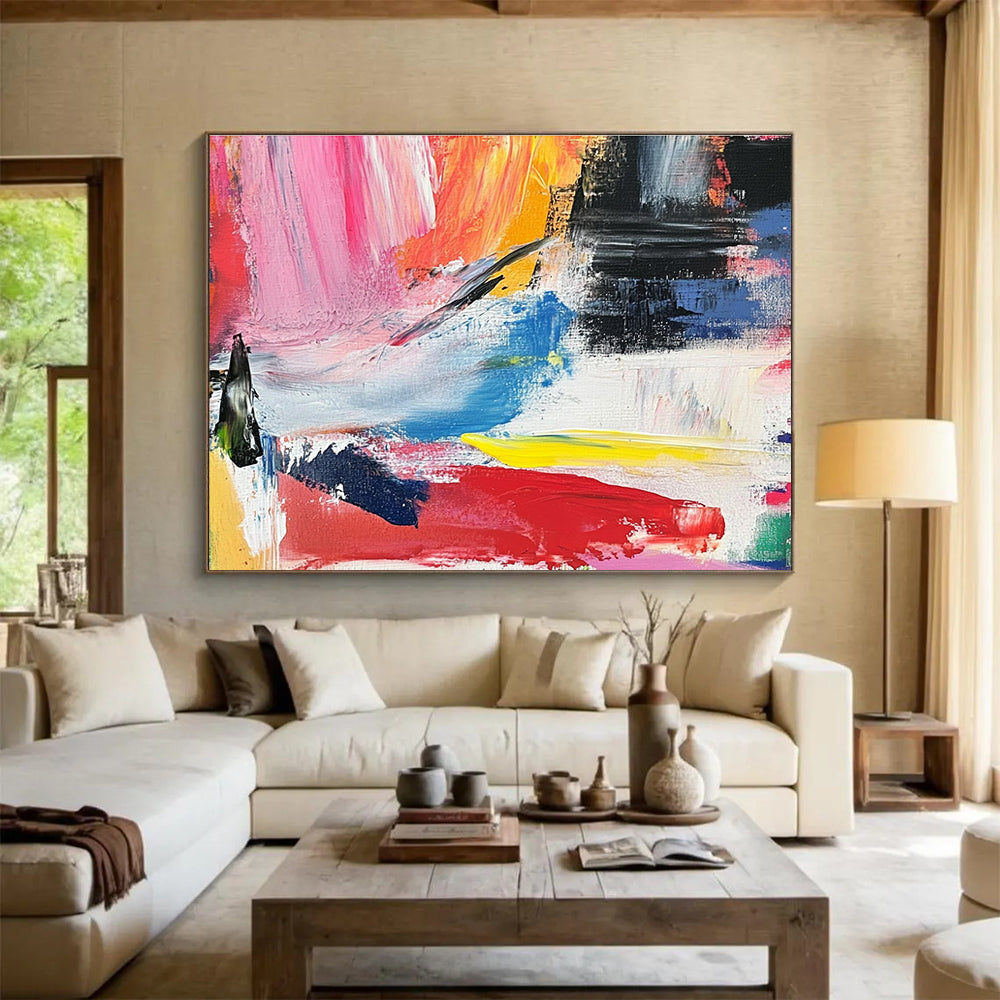 Abstract painting with vibrant colors and bold brush strokes evokes springtime joy and energy in a lively landscape of reds yellows and blues.SC437