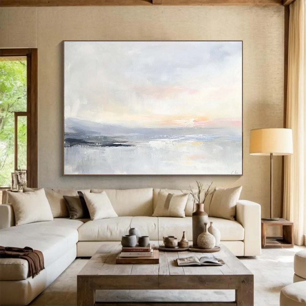 Large abstract painting of a serene ocean landscape in soft pastels with visible brush strokes and a tranquil sunrise over calm waters.SC161