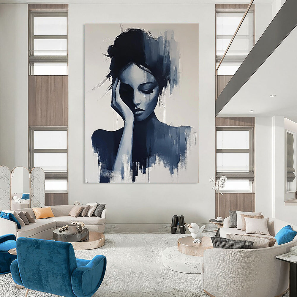 Large abstract painting of a gray woman with her hand on her face and hair up in black and white colors.STSC1378