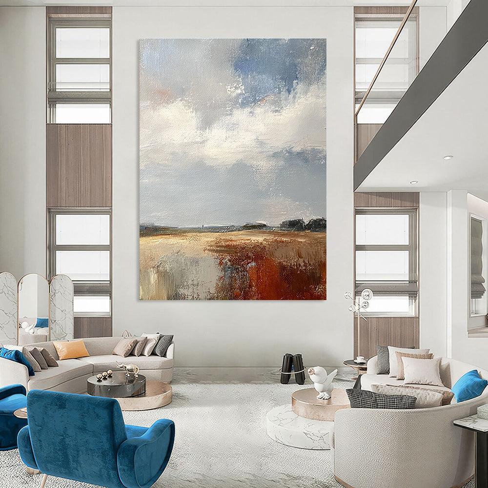 Large abstract painting featuring a white sky grey and brown clouds over the English countryside in muted colors and textured brushwork.STSC172