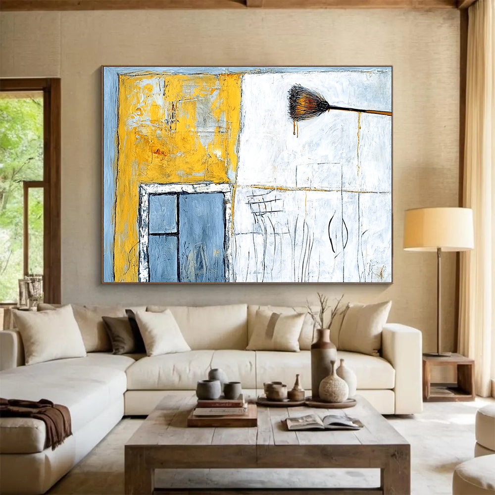 Large abstract painting featuring an old building in yellow and white with an open window and light blue wall details.SC164