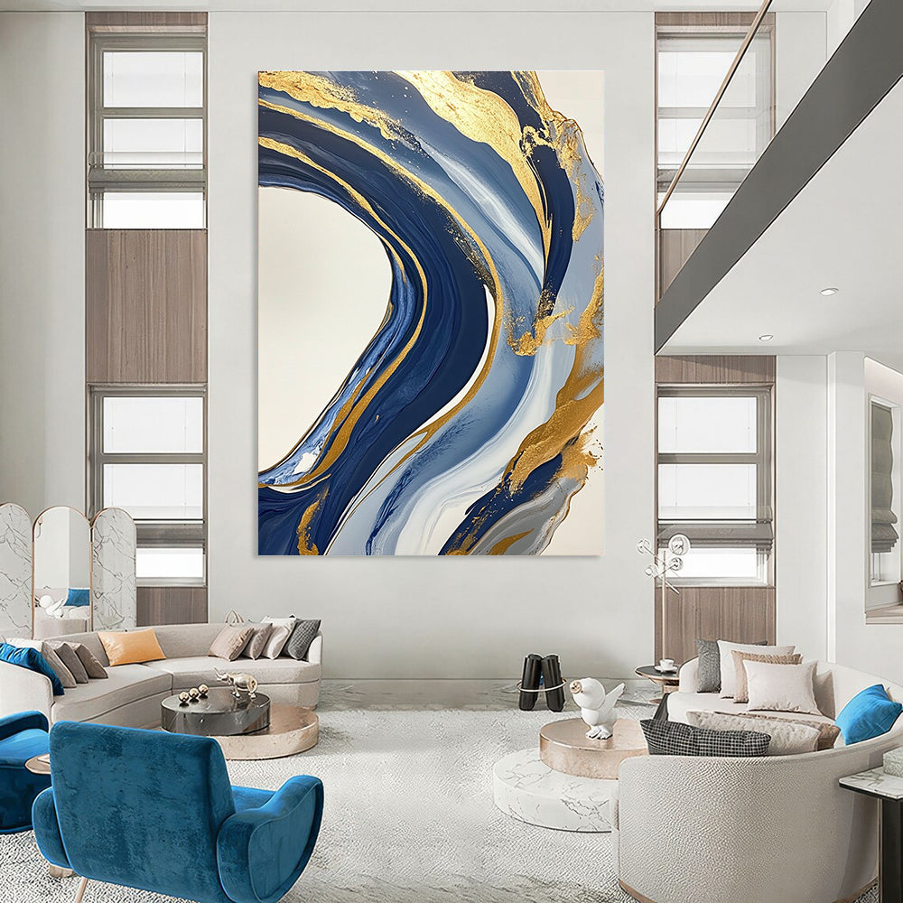 Large abstract blue and gold painting featuring marbling on a white background with swirling gold lines and fluid shapes creating luxurious textures.STSC032