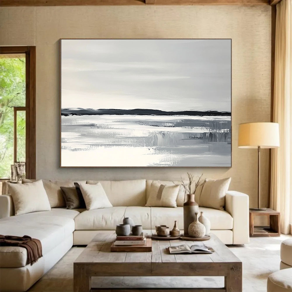 Abstract painting of an Arctic landscape with a white sky gray water and black land featuring thick brush strokes and a monochromatic color scheme.SC154