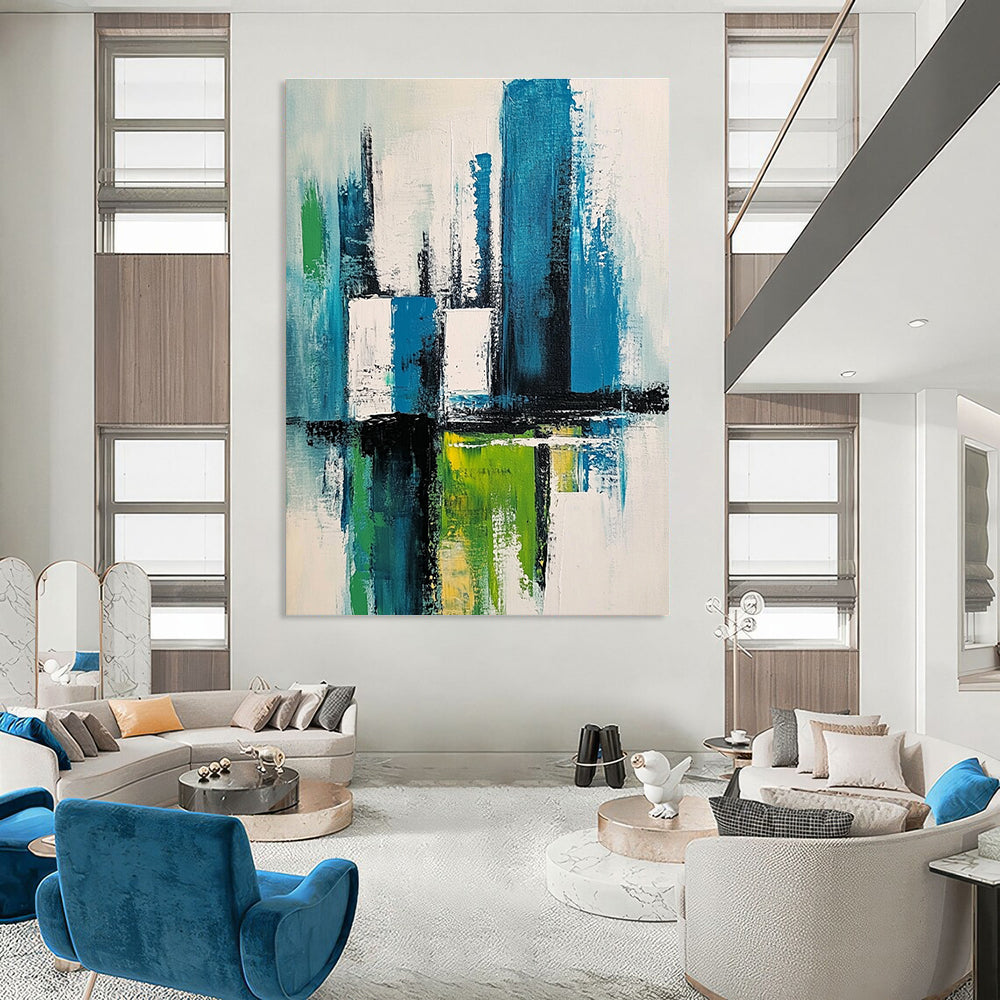 Large abstract painting of a cityscape in blue green and white with thick expressive brush strokes and a minimalistic style.STSC281