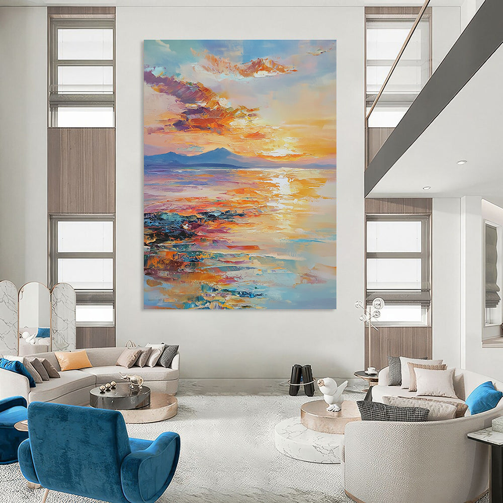 Large abstract painting of an ocean sunset with warm hues reflecting on water showcasing tranquility and nature's beauty in a dreamy atmosphere.STSC865