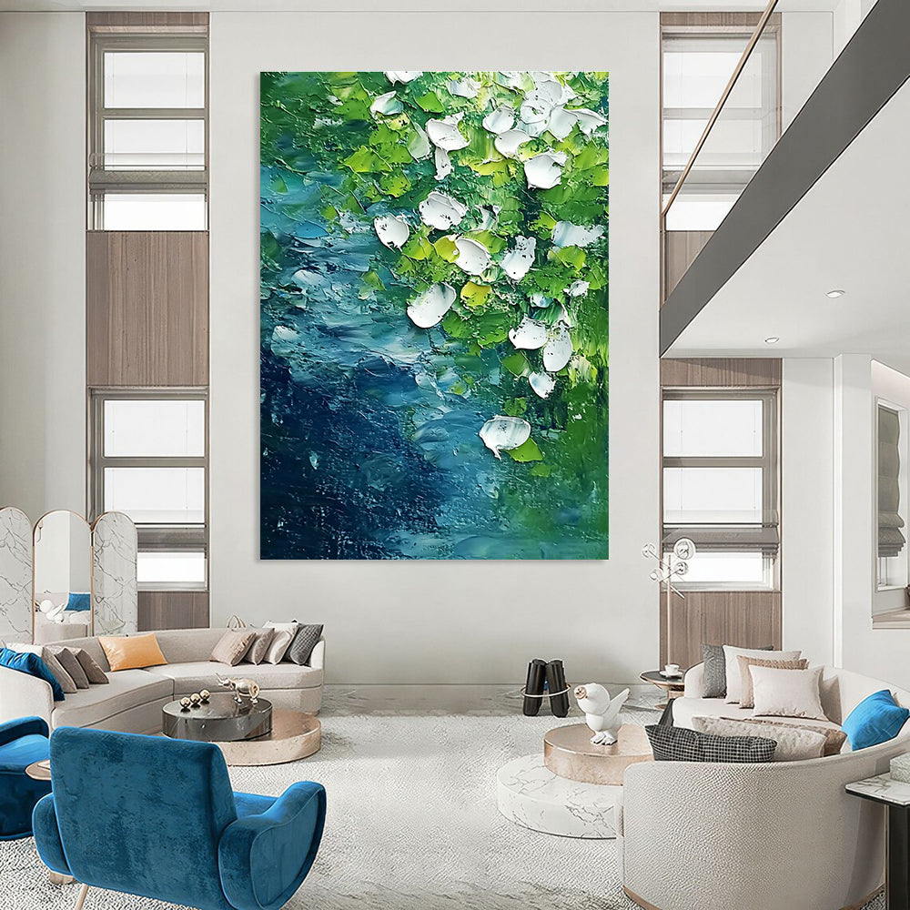 Abstract painting featuring white flowers and flowing water in vibrant green and blue tones capturing the essence of springtime on the riverbank.STSC1477