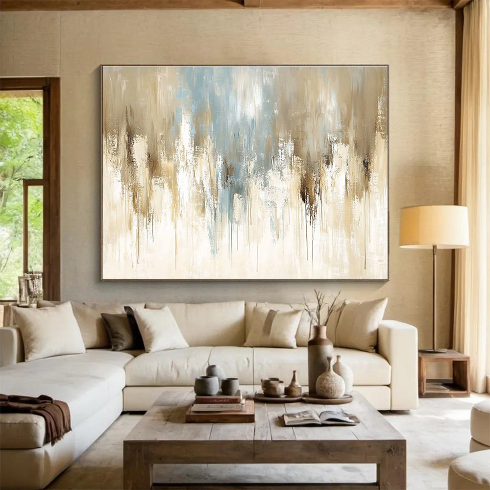 Large abstract painting featuring soft beige and light blue tones with vintage oil texture and elegant paint drips on canvas.SC009