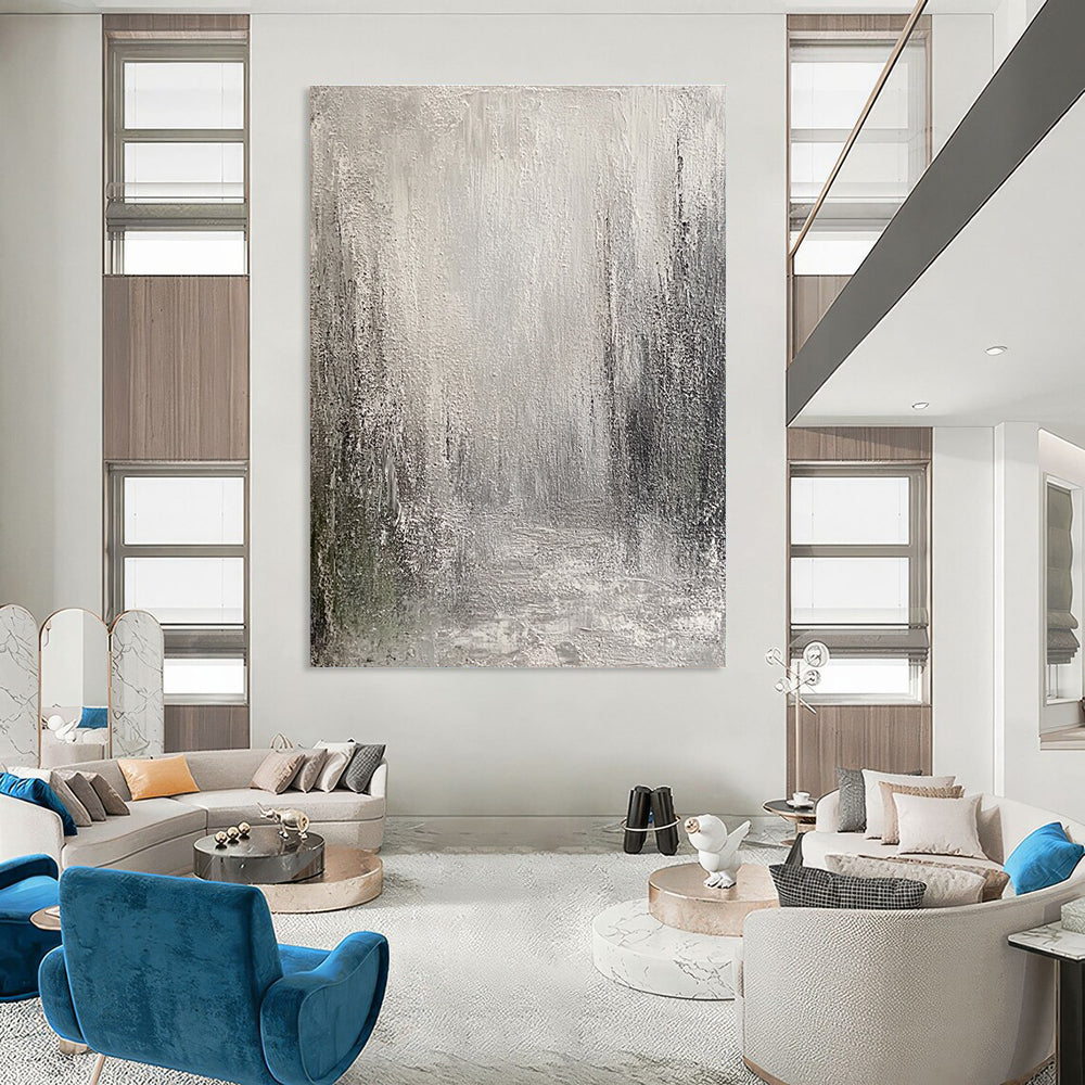 Large abstract painting featuring an atmospheric urban landscape in muted grey and white tones with heavy texture and a mysterious depth.STSC487