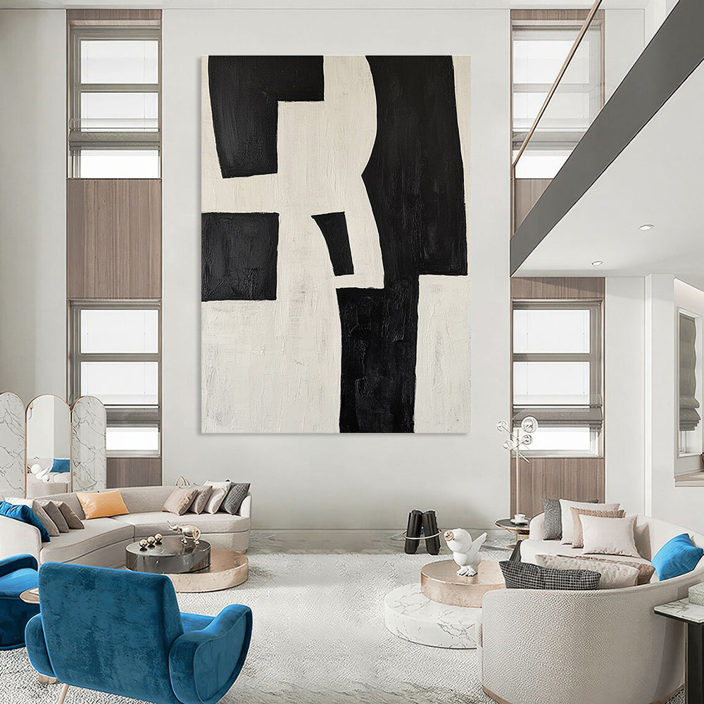 Large abstract painting in black and white featuring deconstructed shapes creating a striking visual impact ideal for modern decor.STSC389