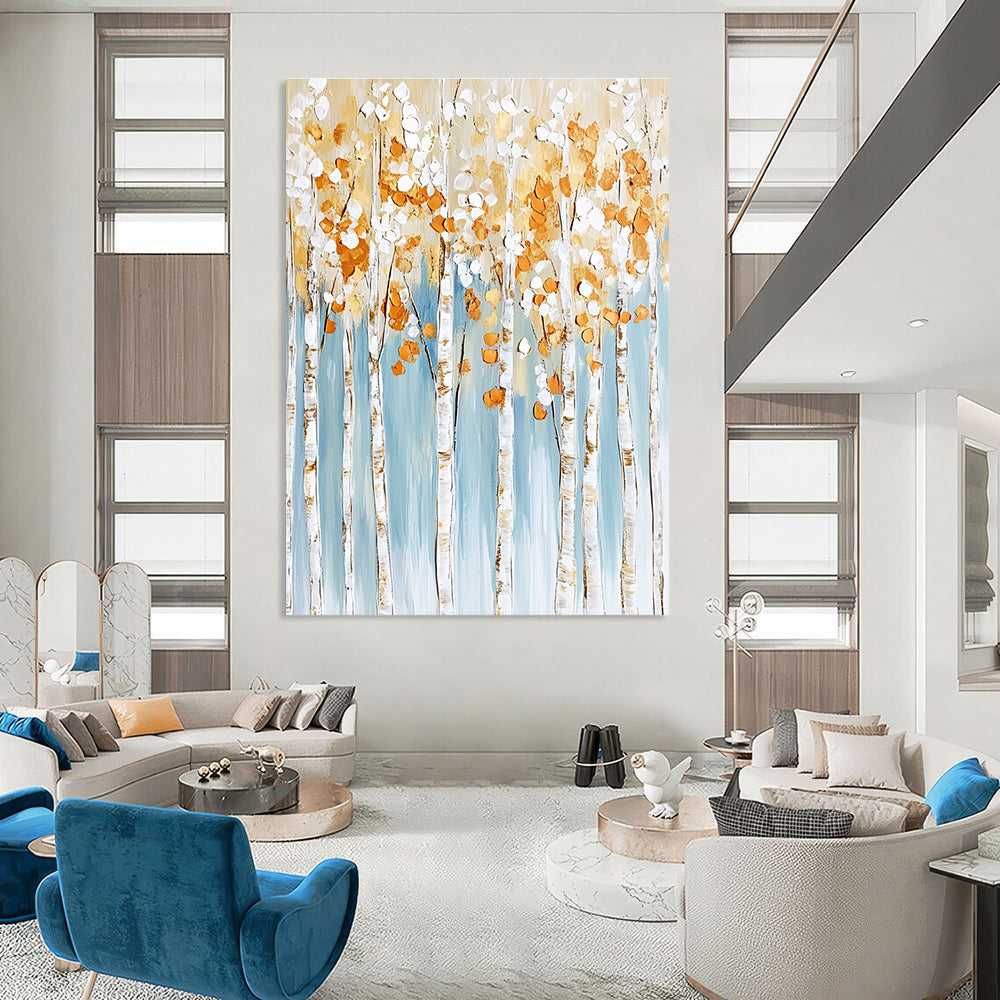 Large abstract painting featuring birch trees with white and gold leaves on a light blue background with textured brushstrokes in neutral tones.STSC302