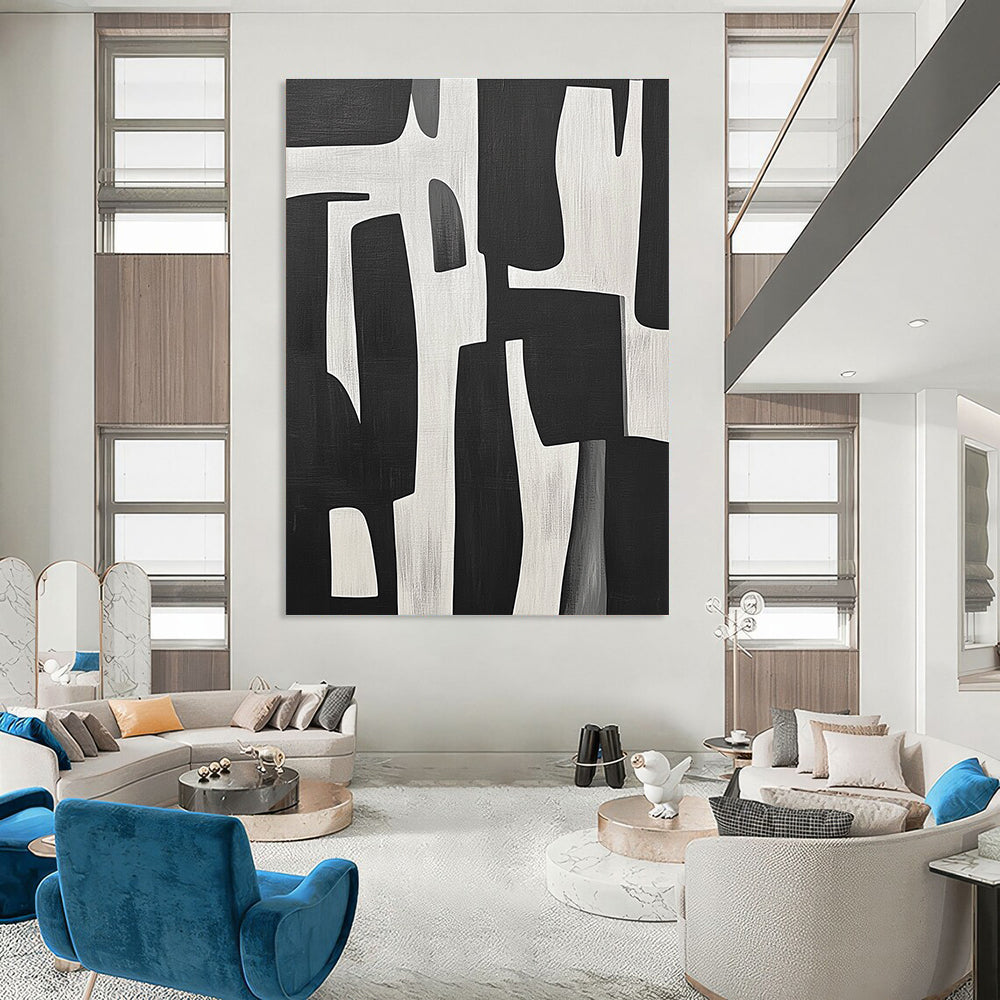 Large abstract painting of black and white shapes inspired by Jean-Paul Gaultier's style showcasing bold contrasts and dynamic forms.STSC328