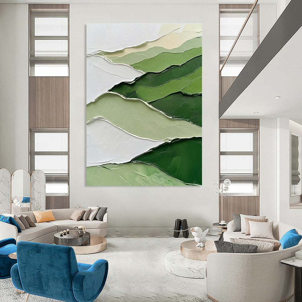 Large abstract painting featuring a green and white mountainous landscape with thick impasto strokes for a textured artistic impact.STSC1005