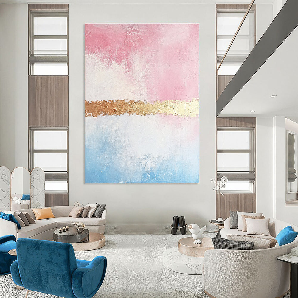 Large abstract painting with soft pink and gold tones textured brushstrokes and a delicate golden line enhancing its minimalist elegance.STSC454