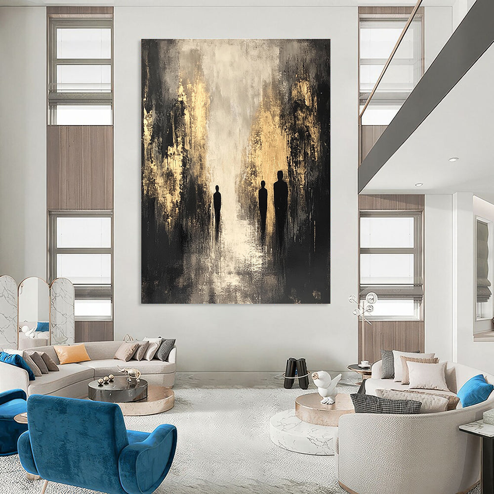 Large abstract painting featuring dark gray and beige tones with gold highlights and black silhouettes creating a shadowy cityscape in a contemplative mood.STSC371