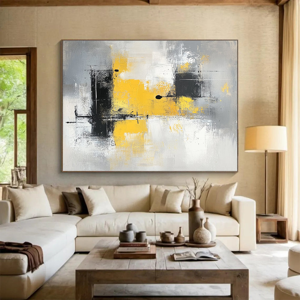 Large abstract painting with gray and yellow tones featuring blocks of color soft edges and delicate brushstrokes on a gray background.SC241
