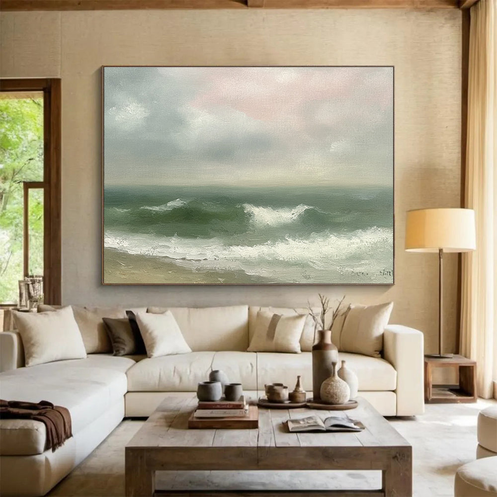 Large abstract painting depicting a vintage seascape with green and gray waves, an empty beach, and a soft pink sky in muted pastels.SC565