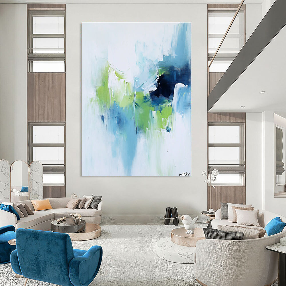 Large abstract painting featuring white blue and green tones with antsky in the lower right corner.STSC826